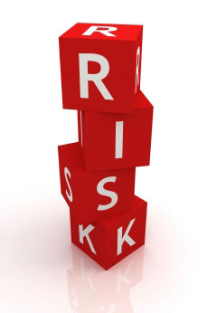RISK spelt on dice