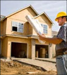 Builder looking at housing plans