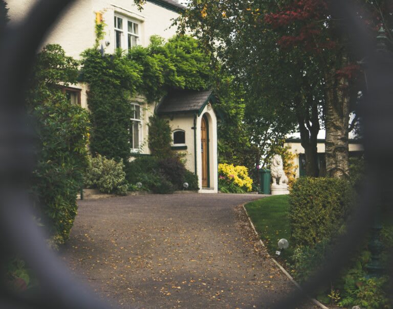 Older house looking through a fence